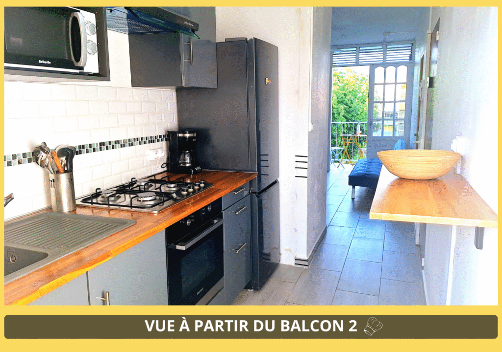 photo3-espace-partagé-cuisine-moderne-équipée-eau-filtré-chambre-chez-l-habitant-ville-les-abymes-proche-aéroport-port-chu-lycée-jarry-site-chambre-d-hotes-guadeloupe.com